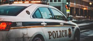 Police car driving to car accident